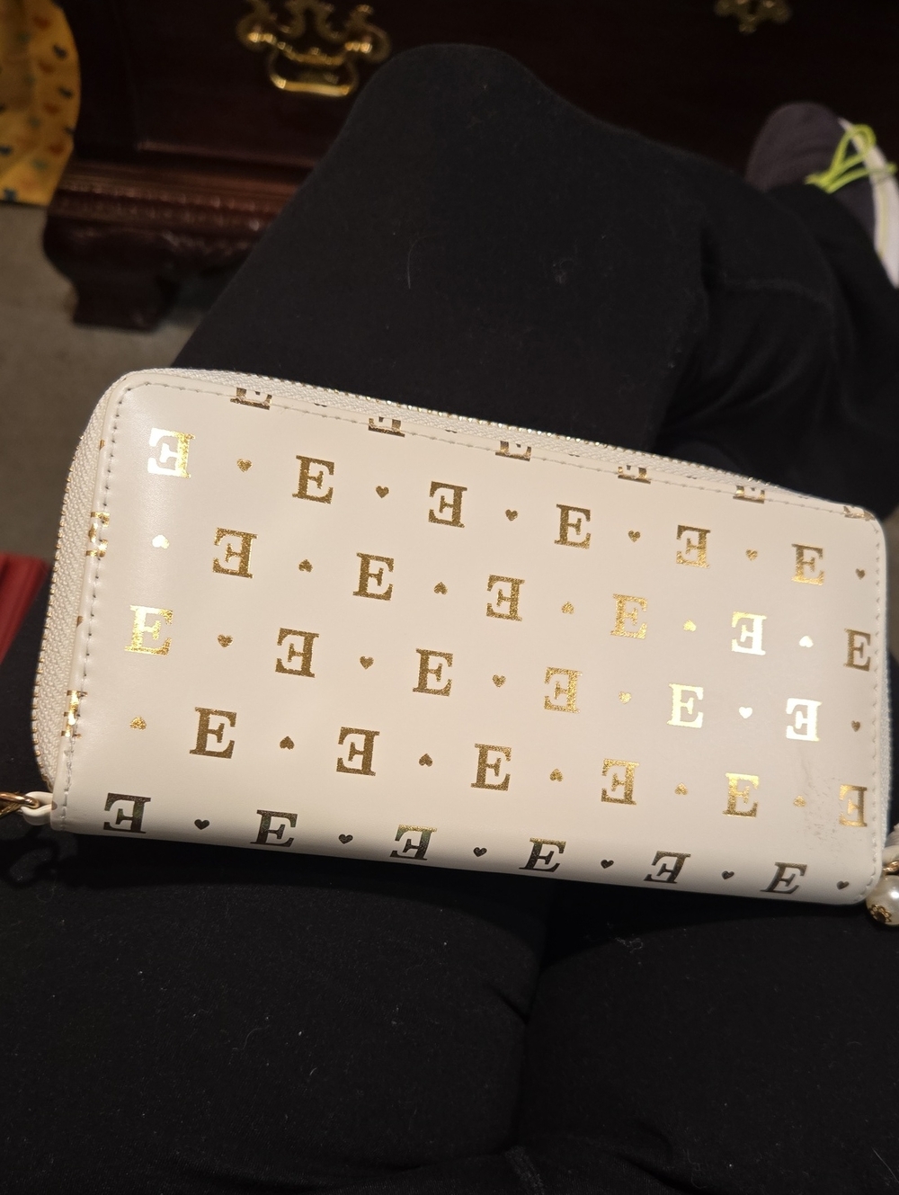 Elegant Cream Zip-Around Wallet with Gold Accents